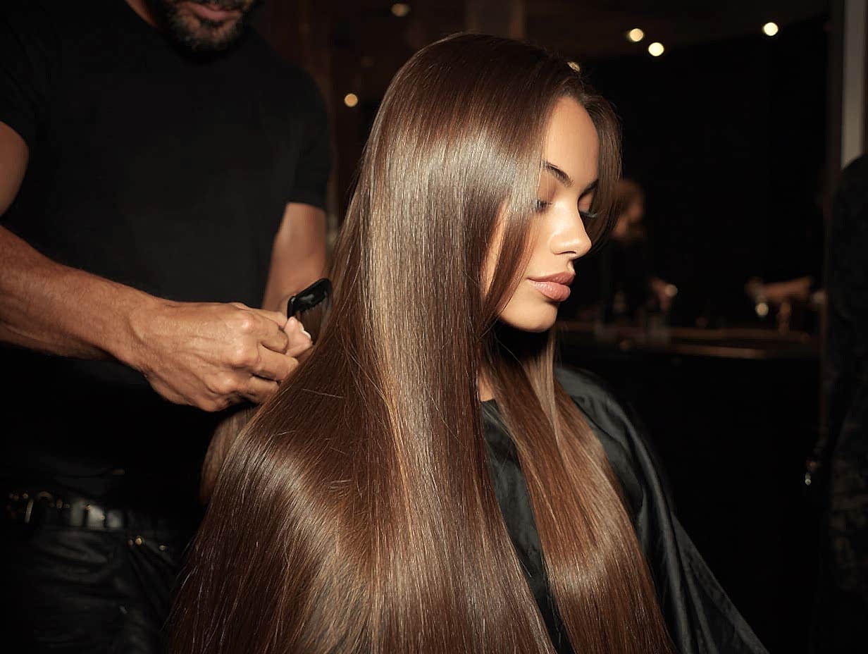 Hair extension aftercare at luxury salon, smooth brushed extensions